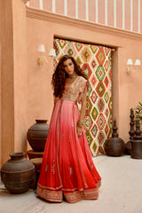 Aleah coral ombre set with longline jacket with crop inner and ruched lehenga.