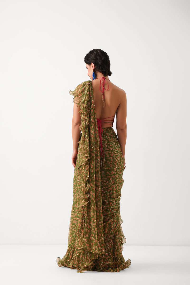 The Ezra Jhilmil saree set in avacado green with rani ambi blouse