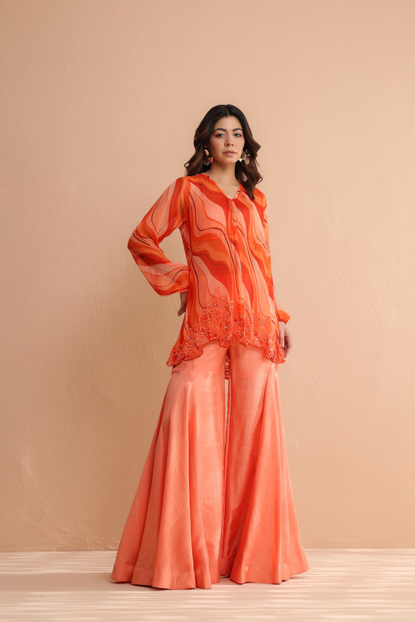 Tequila sunrise tunic with exaggerated bell-bottoms