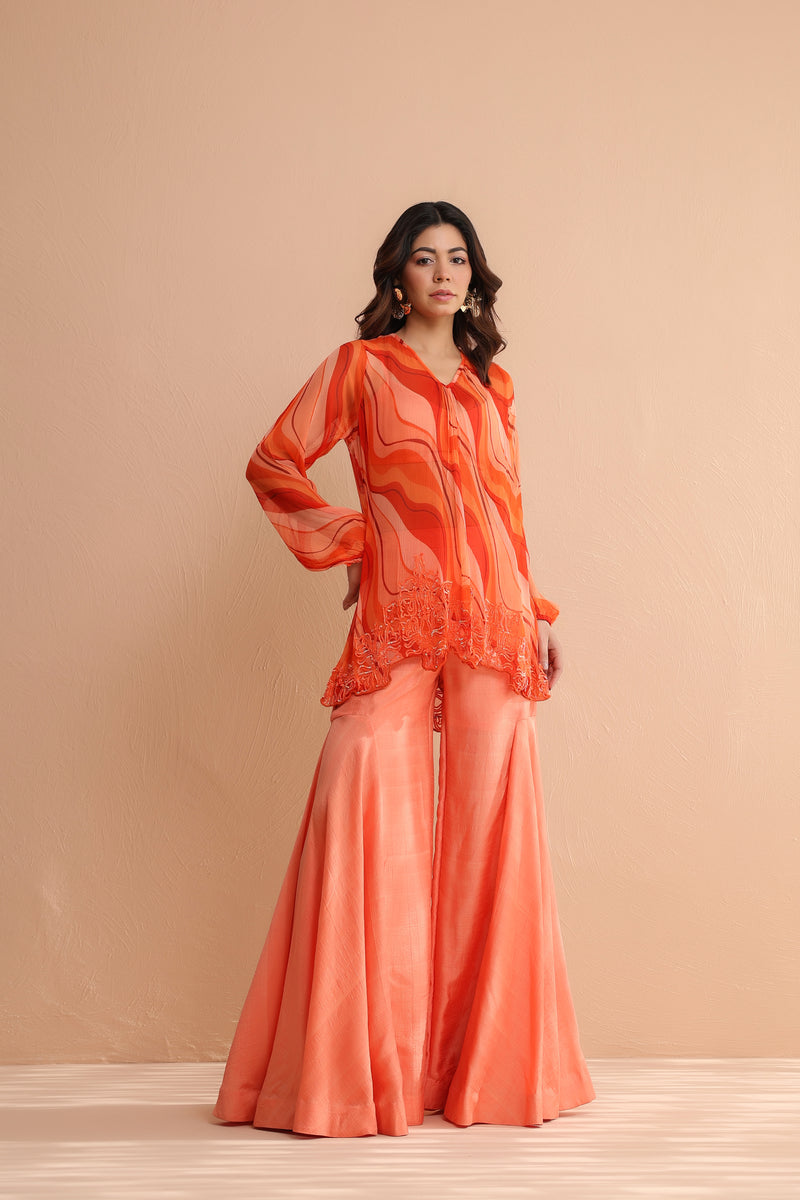 Tequila sunrise tunic with exaggerated bell-bottoms