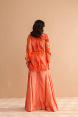 Tequila sunrise tunic with exaggerated bell-bottoms