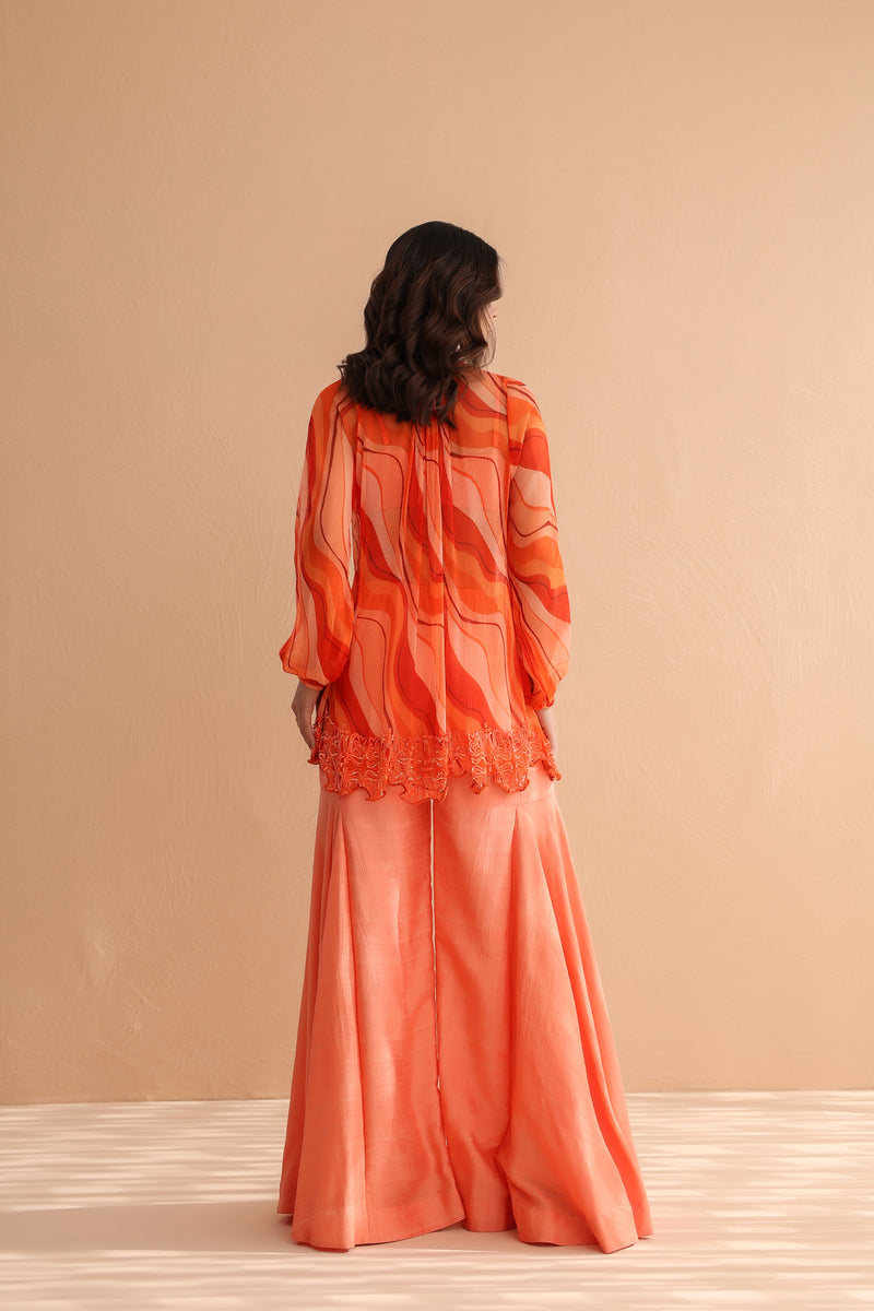 Tequila sunrise tunic with exaggerated bell-bottoms