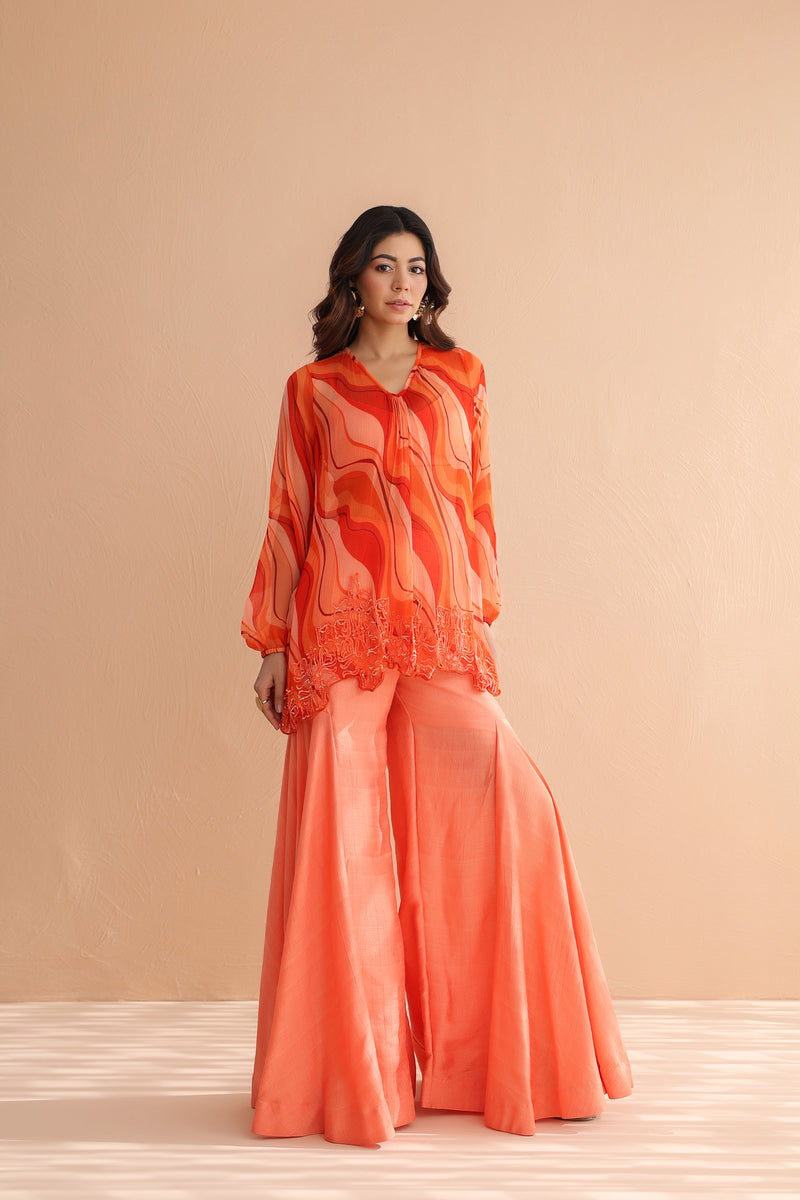 Tequila sunrise tunic with exaggerated bell-bottoms