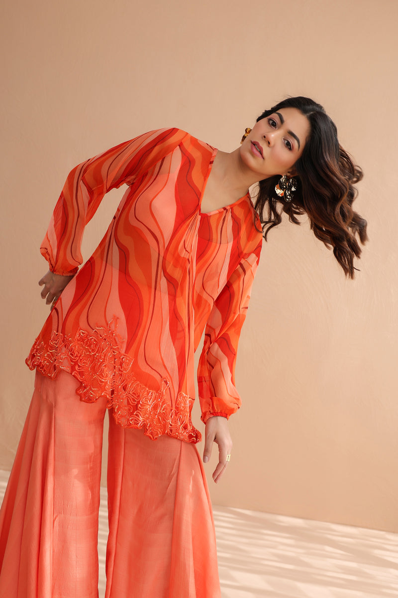 Tequila sunrise tunic with exaggerated bell-bottoms