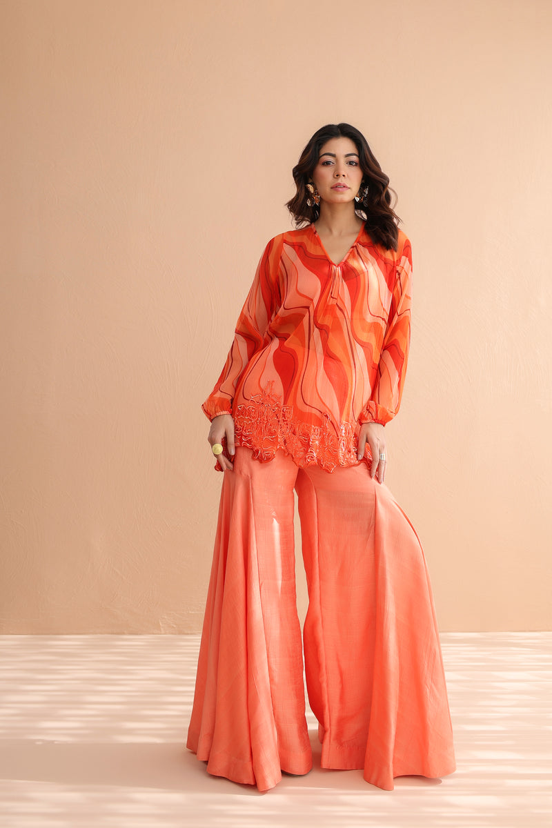 Tequila sunrise tunic with exaggerated bell-bottoms