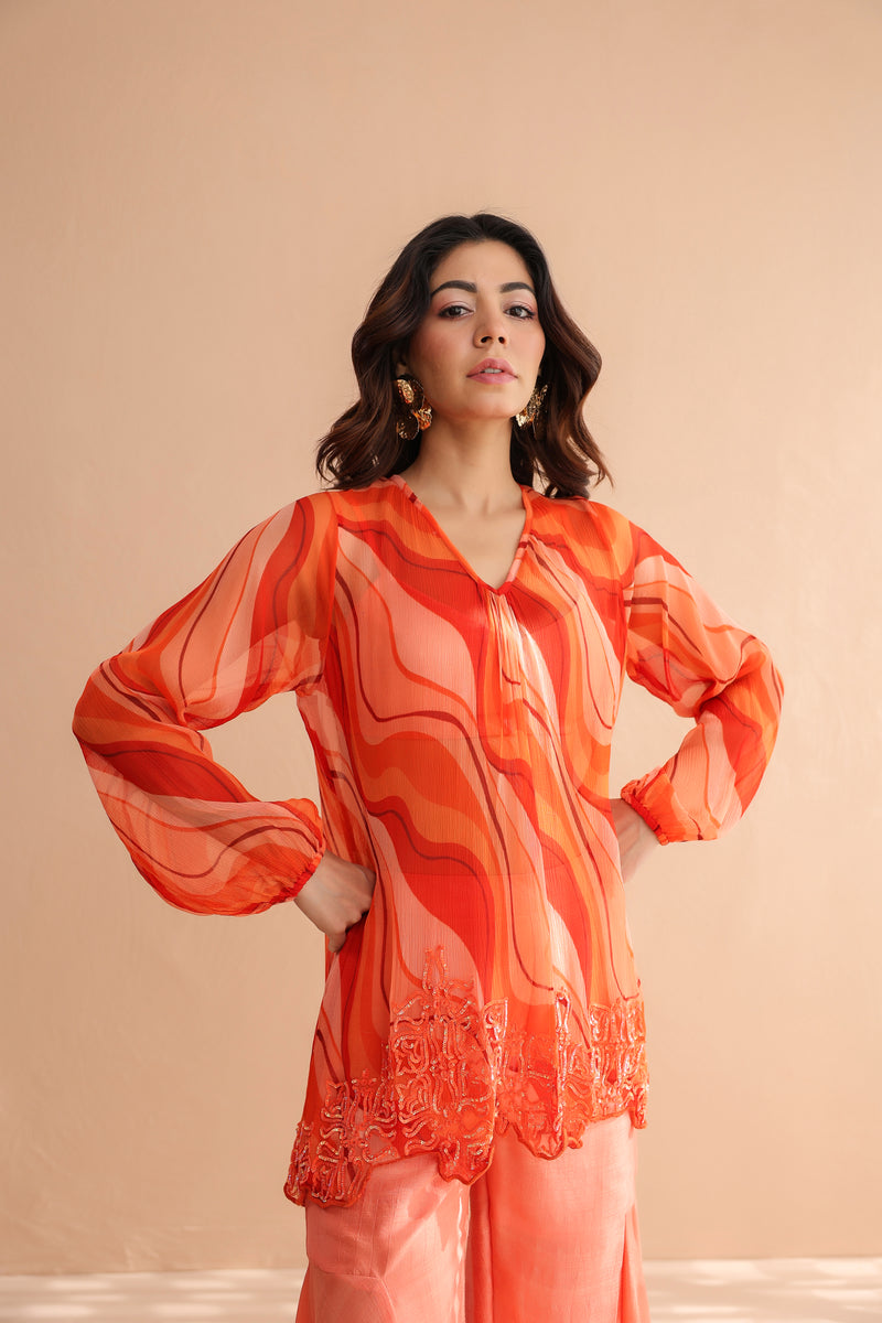 Tequila sunrise tunic with exaggerated bell-bottoms