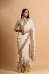 Fawn cutwork saree with strap blouse and jacket