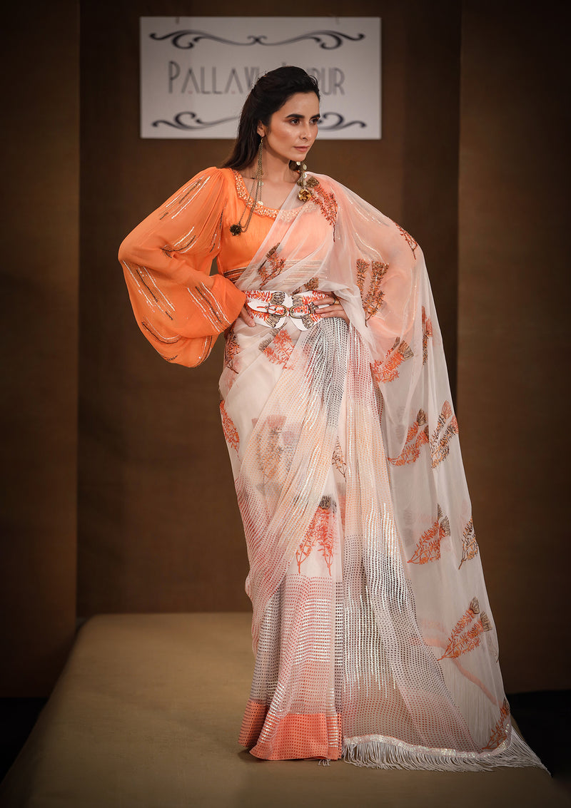 Rangeen Almond Peach fringe saree with Aakarshak blouse Set