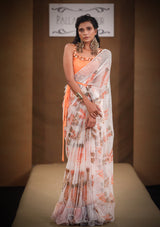 Haseen Almond Peach ruffle saree with Manohar blouse